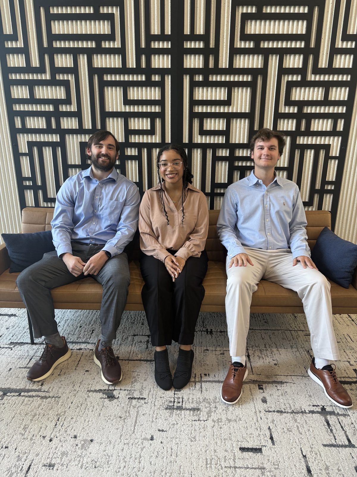 Summit Ridge leaders seated together in a lounge area
